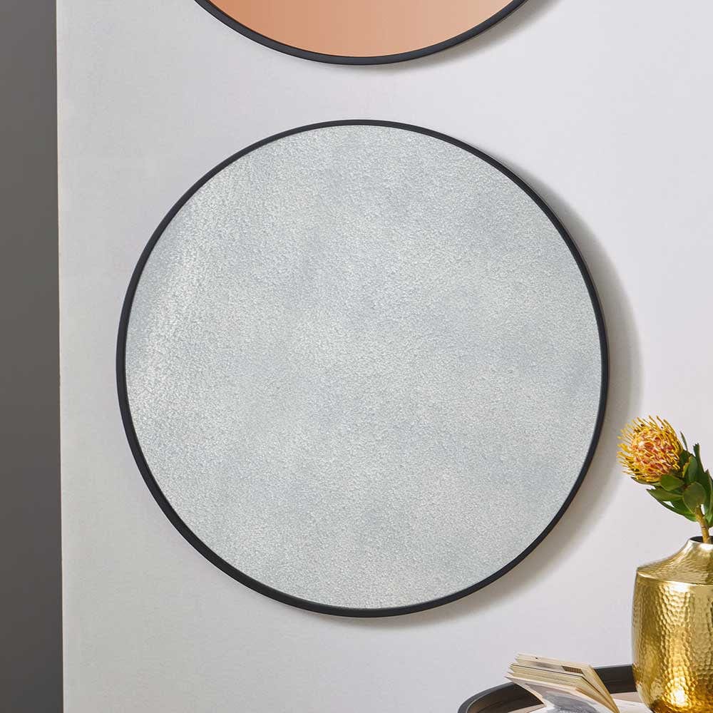 Black Wood Veneer and Foxed Glass Round Wall Mirror.
