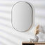 Brushed Silver Metal Slim Frame Oval Wall Mirror.