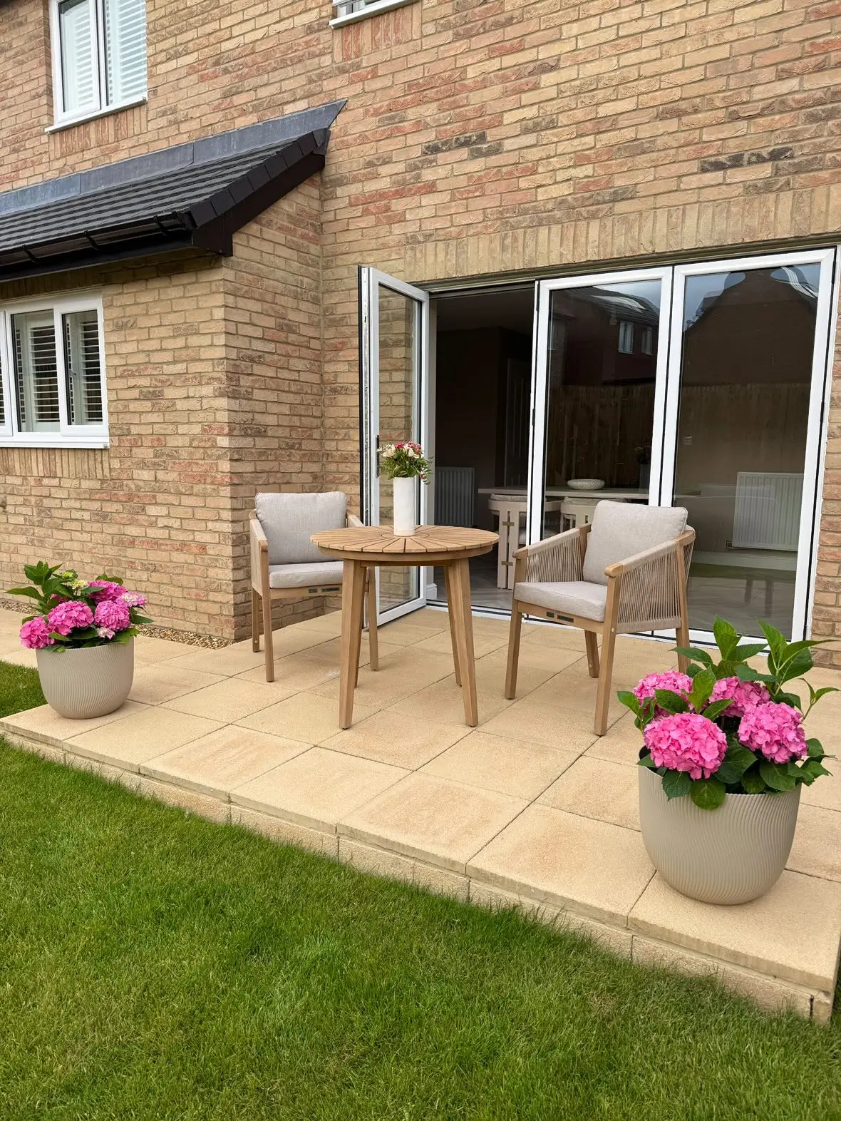 Royalcraft Outdoor Furniture Roma 2 Seater Round Sunray Bistro Set with Roma Dining Chairs House of Isabella UK