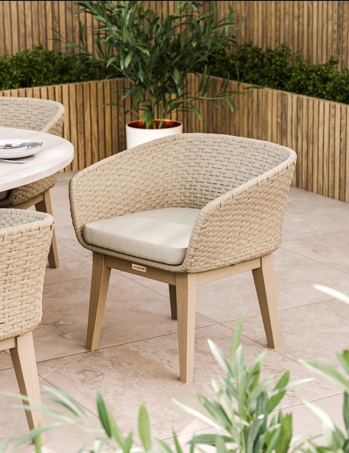 Royalcraft Outdoor Furniture Saturn 6 Seater Ellipse D Conical Dining Set with Eden Dawn Dining Chairs House of Isabella UK