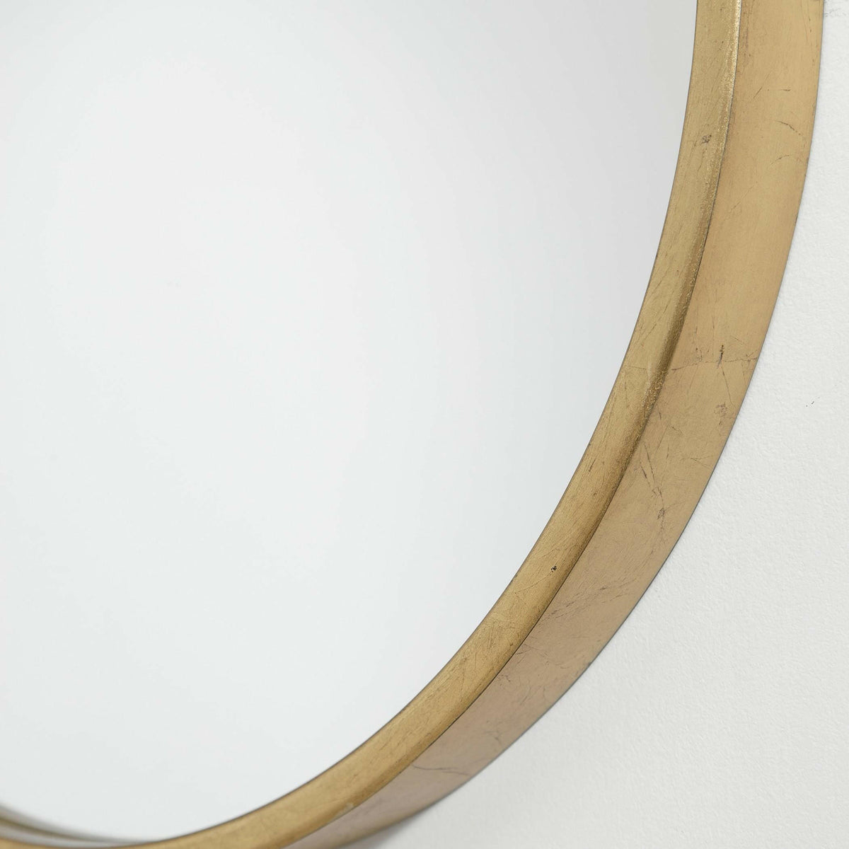 Varina Minimalist Gold Oval Mirror.