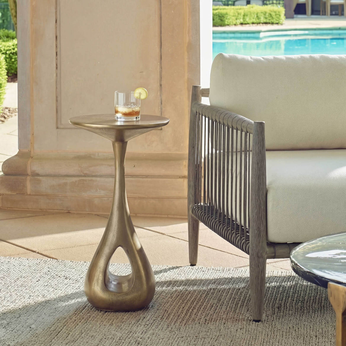 Uttermost Outdoors Tolstoy Indoor-Outdoor Side Table in Brass House of Isabella UK