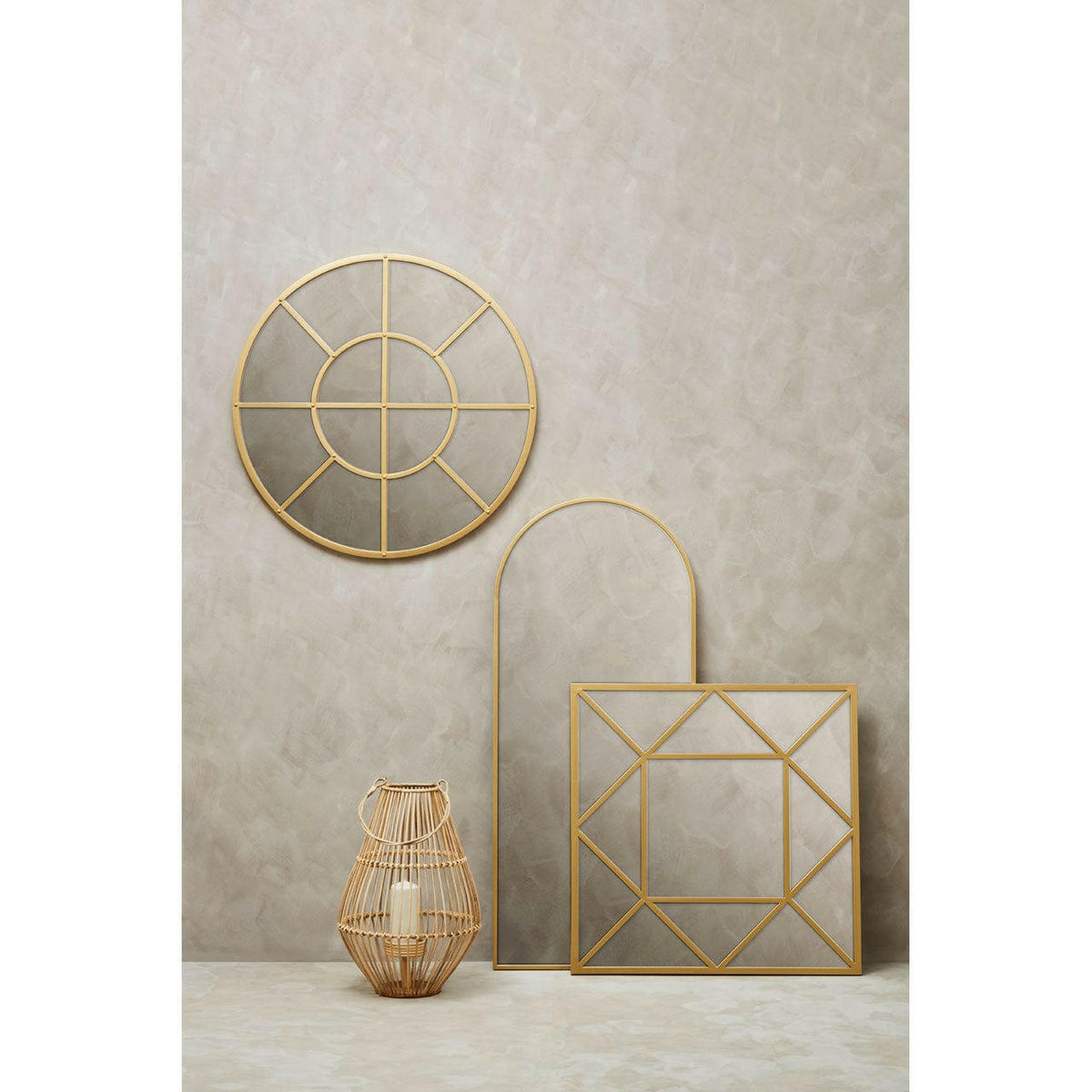 Descartes Gold Finish Round Wall Mirror.