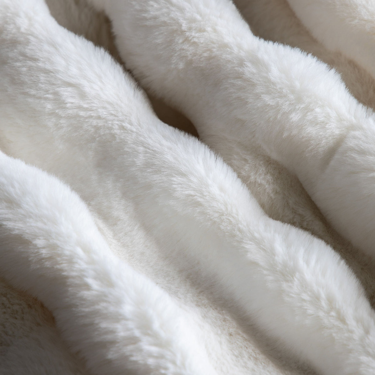 Marshmallow Rabbit Fur Throw Cream.