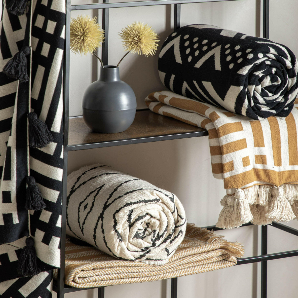 Devoran Knitted Tassel Throw Ochre.