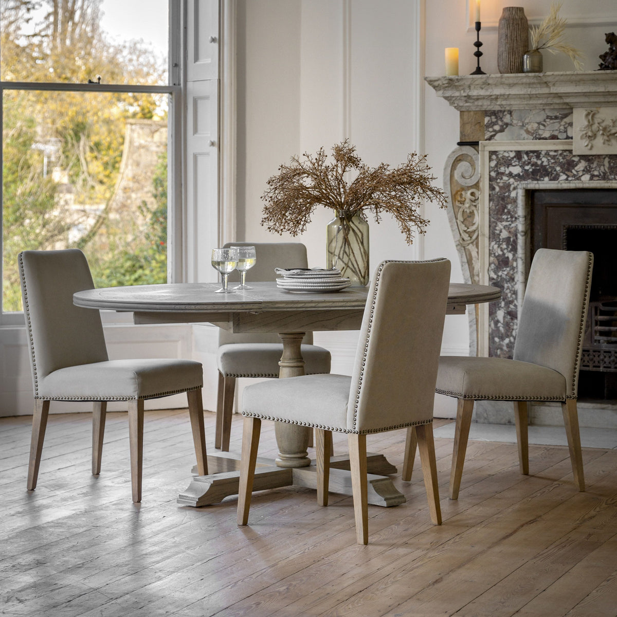 Dunbar Round Extending Dining Table.