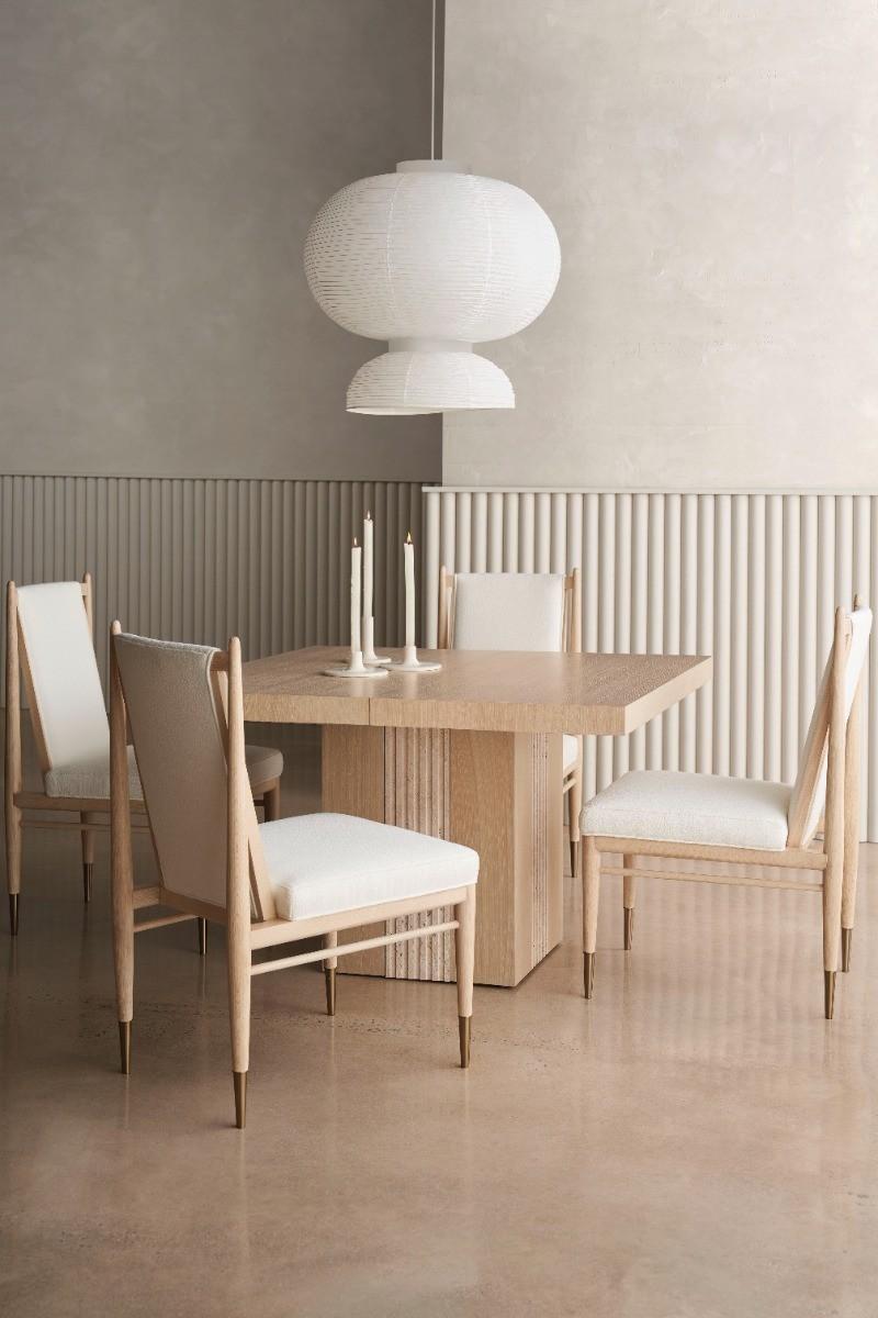 Caracole Unity Light Extending Dining Table.