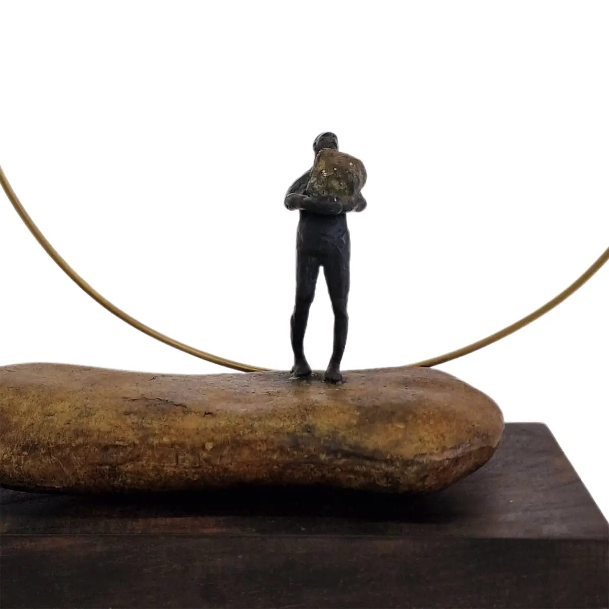 Bronze Figure On Rock With Ring.