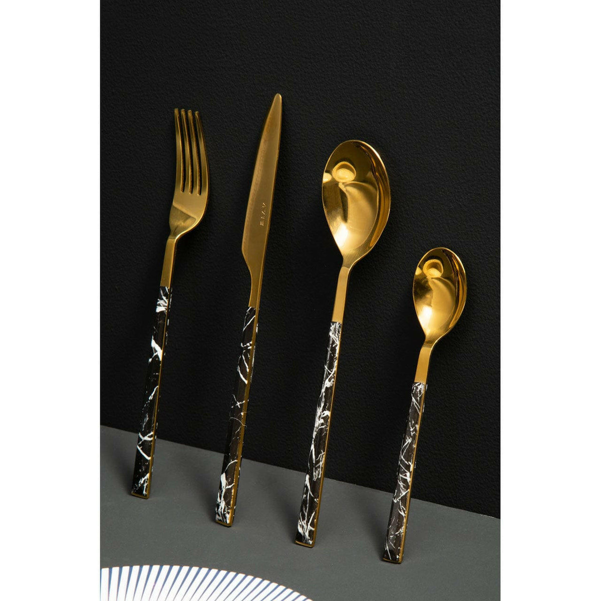Avie 16Pc Black Faux Marble Cutlery Set.