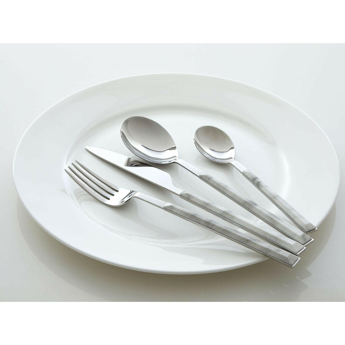 Avie 16Pc White Faux Marble Cutlery Set.