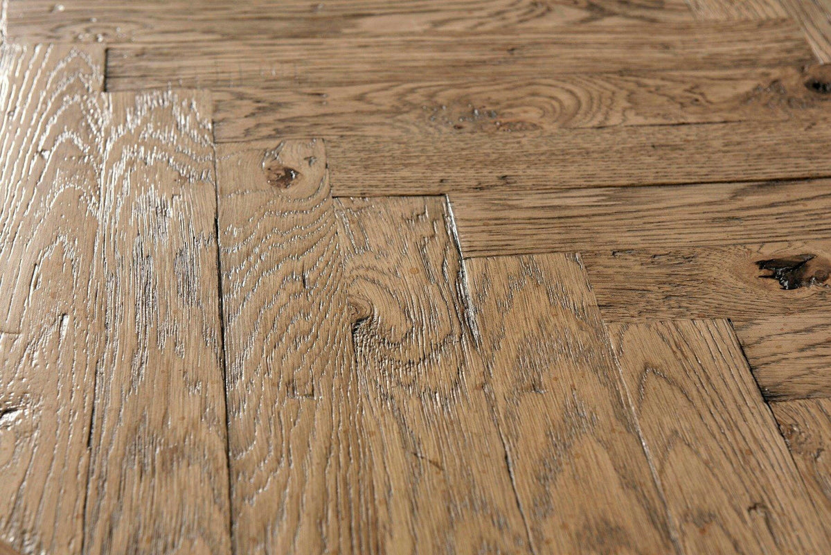 Theodore Alexander Extendable Dining Table Callan in Echo Oak.