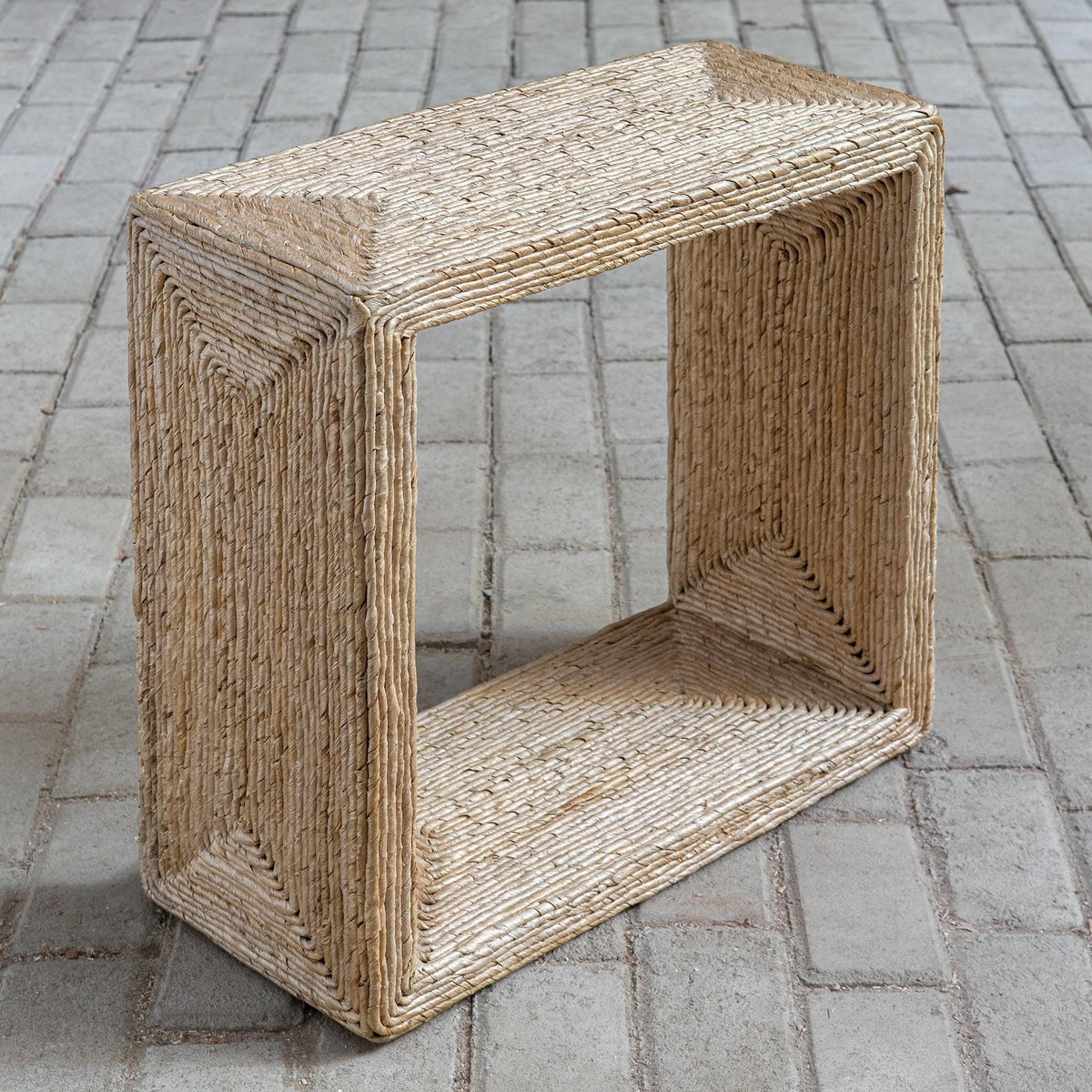 Uttermost Rora Woven Accent Table.